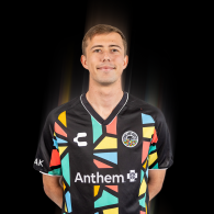 Wolfgang Prentice wearing an Oakland Roots SC 2025 Primary Kit.