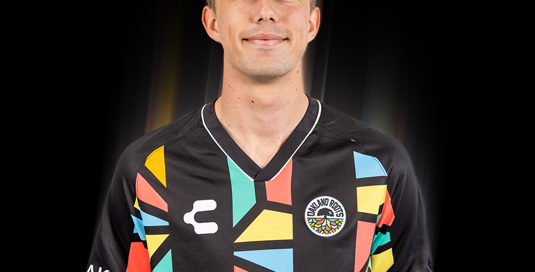 Wolfgang Prentice wearing an Oakland Roots SC 2025 Primary Kit.
