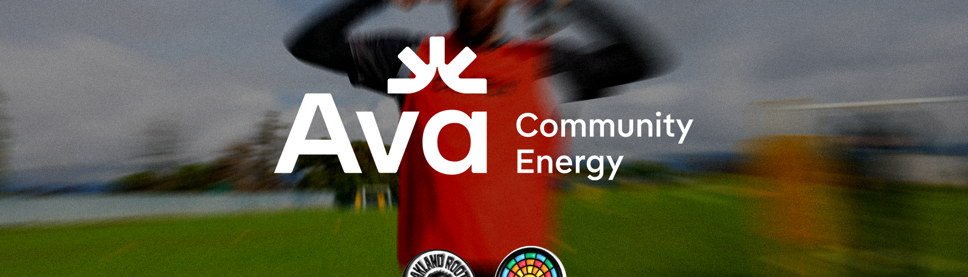 Logo lock up of Ava Community Energy, and Oakland Roots and Soul Sports Club.