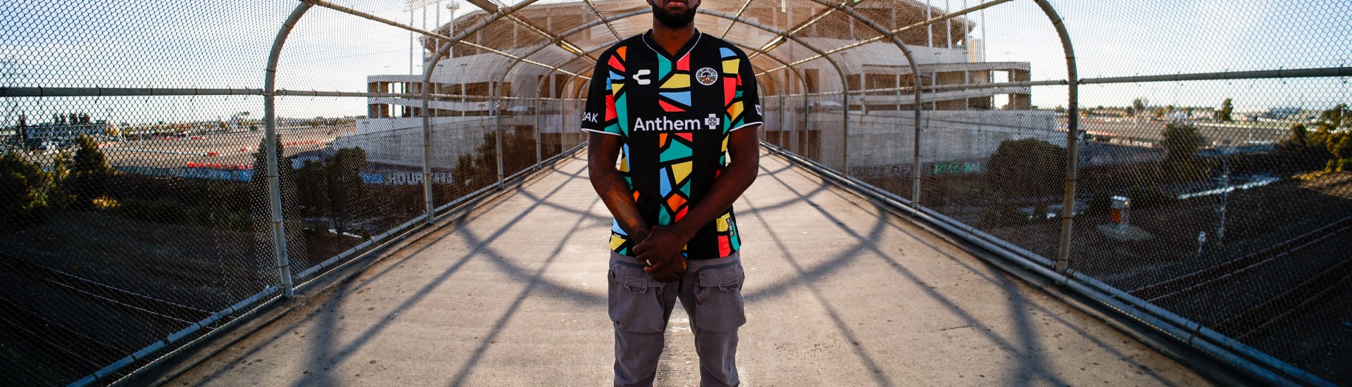 Image of Kai Greene wearing an Oakland Roots SC jersey.