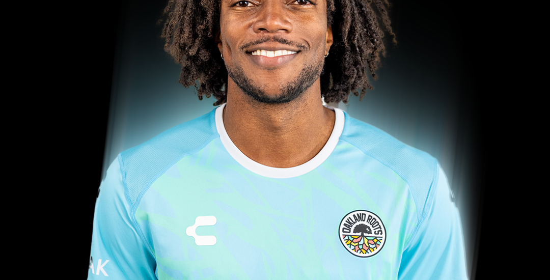 Kendall McIntosh wearing an Oakland Roots SC keeper kit.