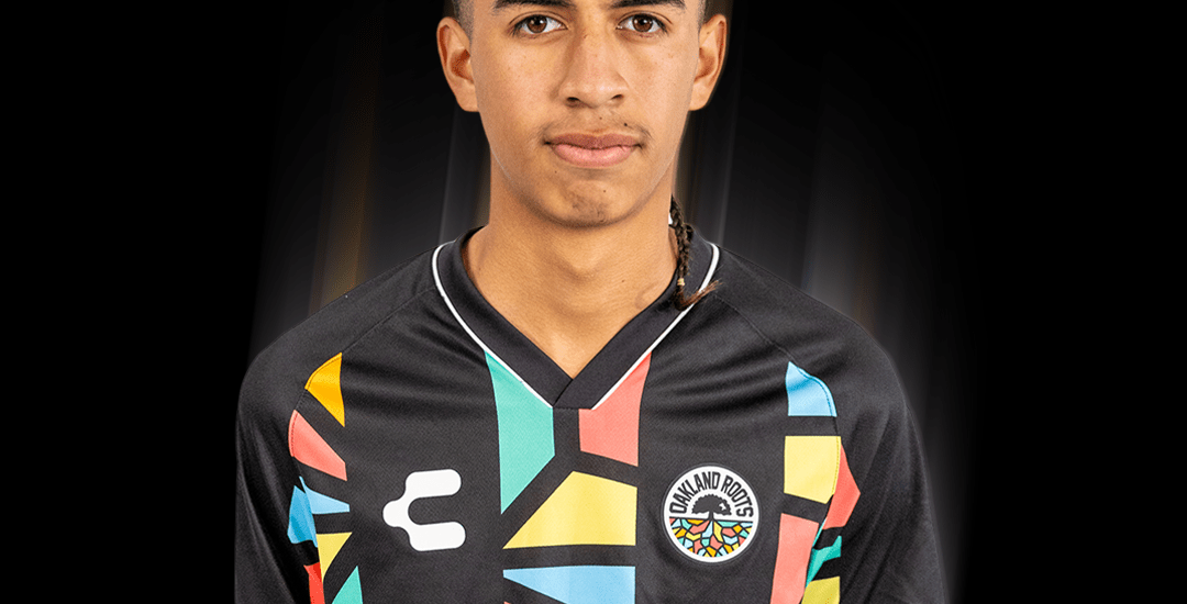 Emilio Martinez wearing an Oakland Roots SC primary kit jersey.